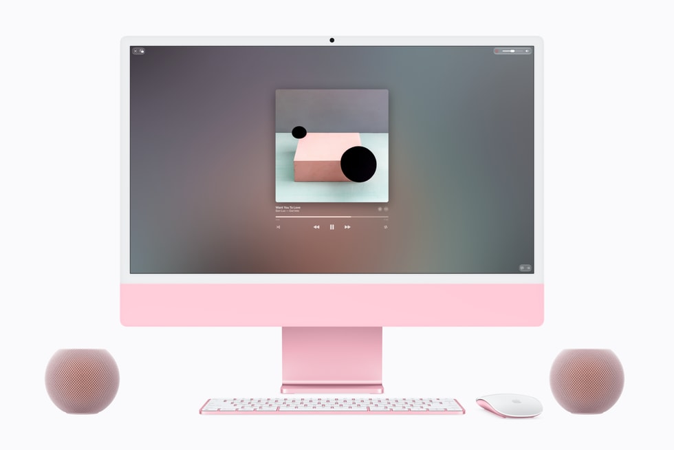 Hai loa HomePod mini 2 màu hồng đặt cạnh iMac cùng tông màu