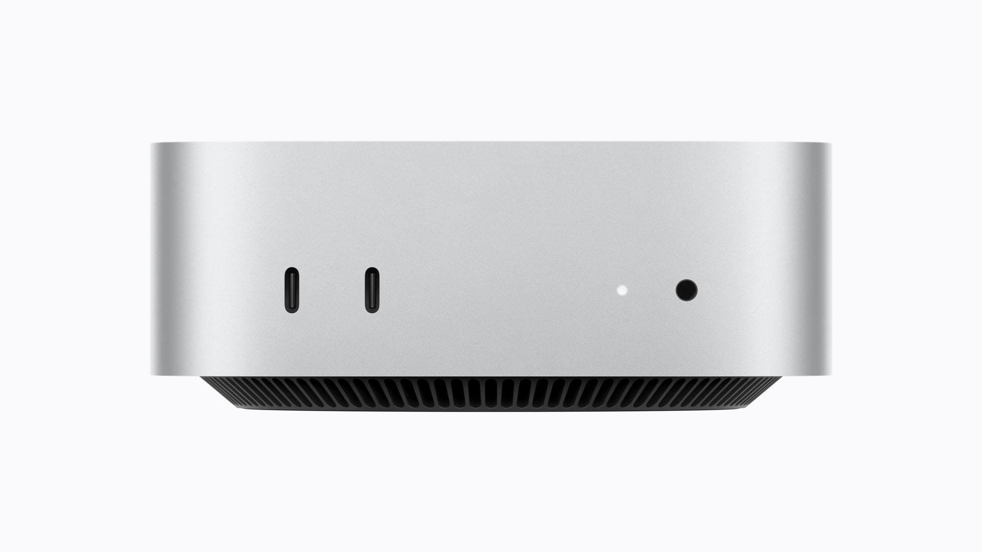 Mặt trước Mac mini M6 với hai cổng USB-C và jack tai nghe 3.5 mm