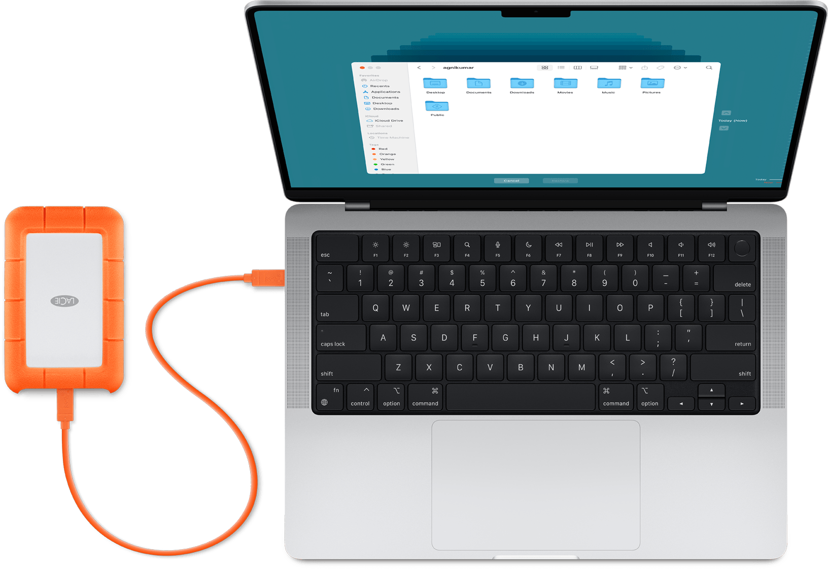 MacBook Pro bên cạnh ổ đĩa ngoài dùng cho Time Machine